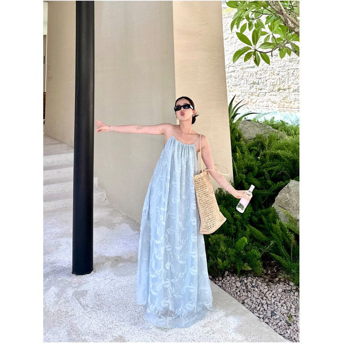 CML s new elegant and ethereal Tencel halter neck dress with pleats perfect for beach vacations image 0