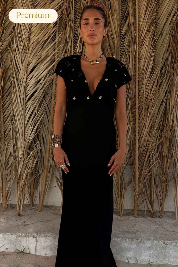 Black Crochet Shell Elodie Dress Petite with gold shell embellishments and a crochet bodice for a vacation look.