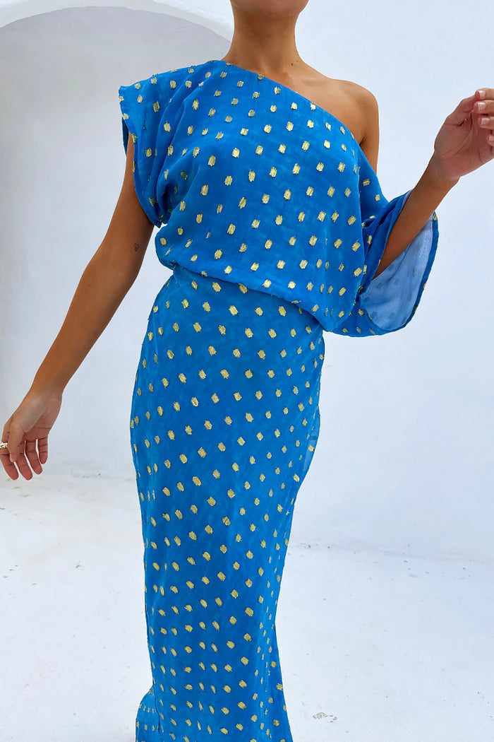 Blue Jacquard Tilly Dress with gold metallic dots, featuring an off-the-shoulder neckline and elasticated waist.
