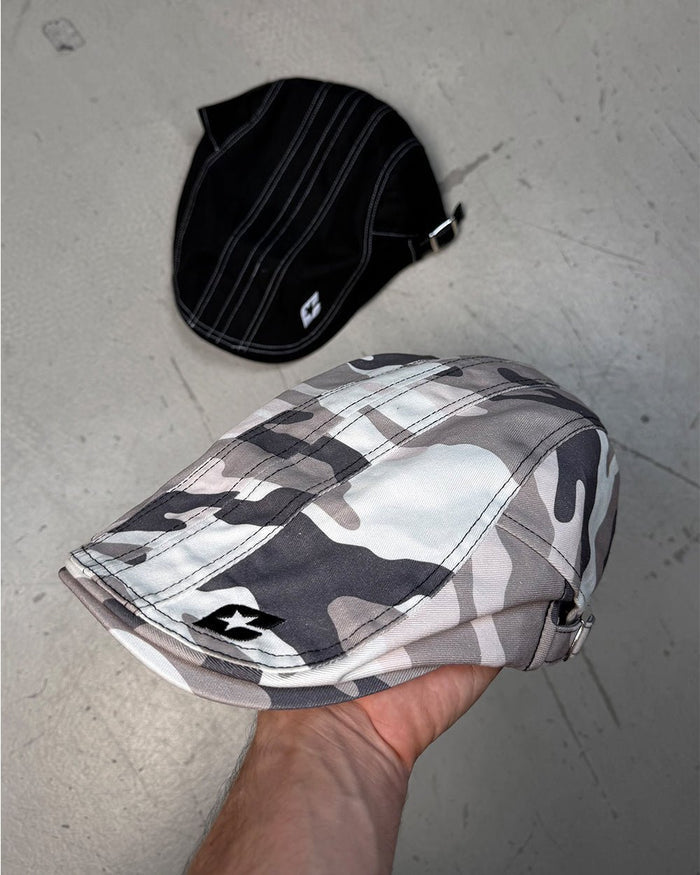 BONET CAMO - grey camo flat cap, detail in hand - Cold Culture