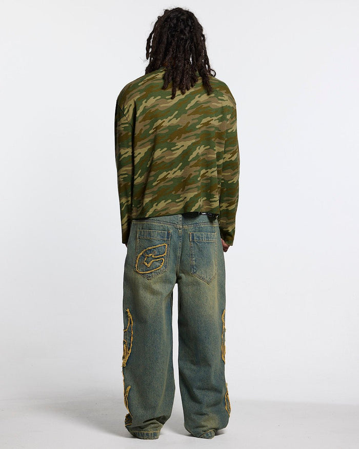 BONEY LONGSLEEVE CAMO - camo skeleton print longsleeve tee, back view on male model - Cold Culture #man