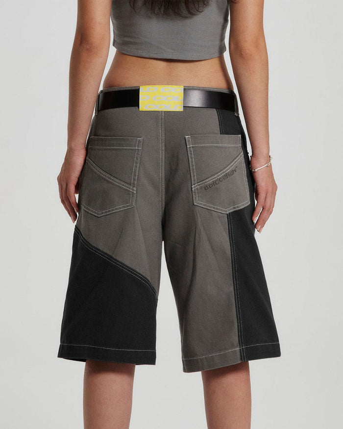 BUTTERFLY V2 SHORTS GREY/BLACK DENIM - grey black patchwork denim shorts, back view on female model - Cold Culture #woman