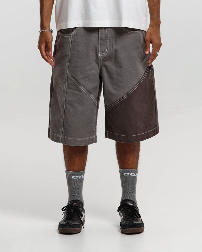 BUTTERFLY V2 SHORTS GREY/BLACK DENIM - grey black patchwork denim shorts, front view on male model - Cold Culture #man