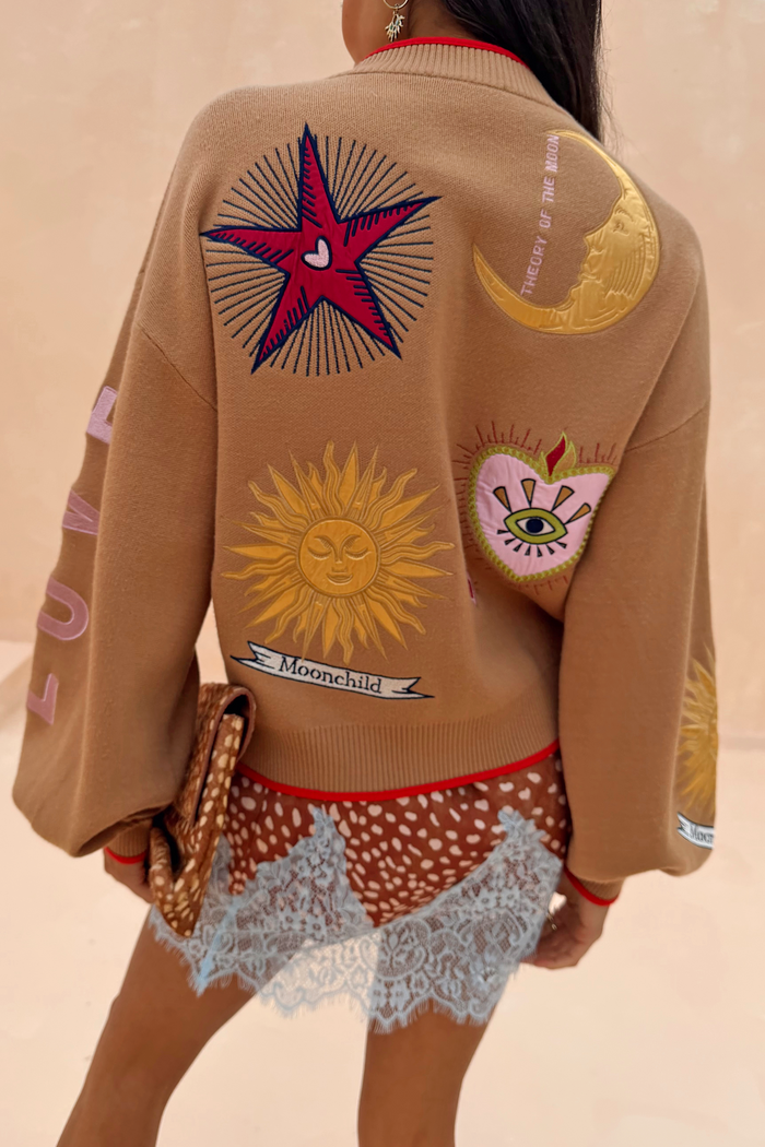 Camel Mystical Cardigan featuring embroidered sun and moon motifs on the back.