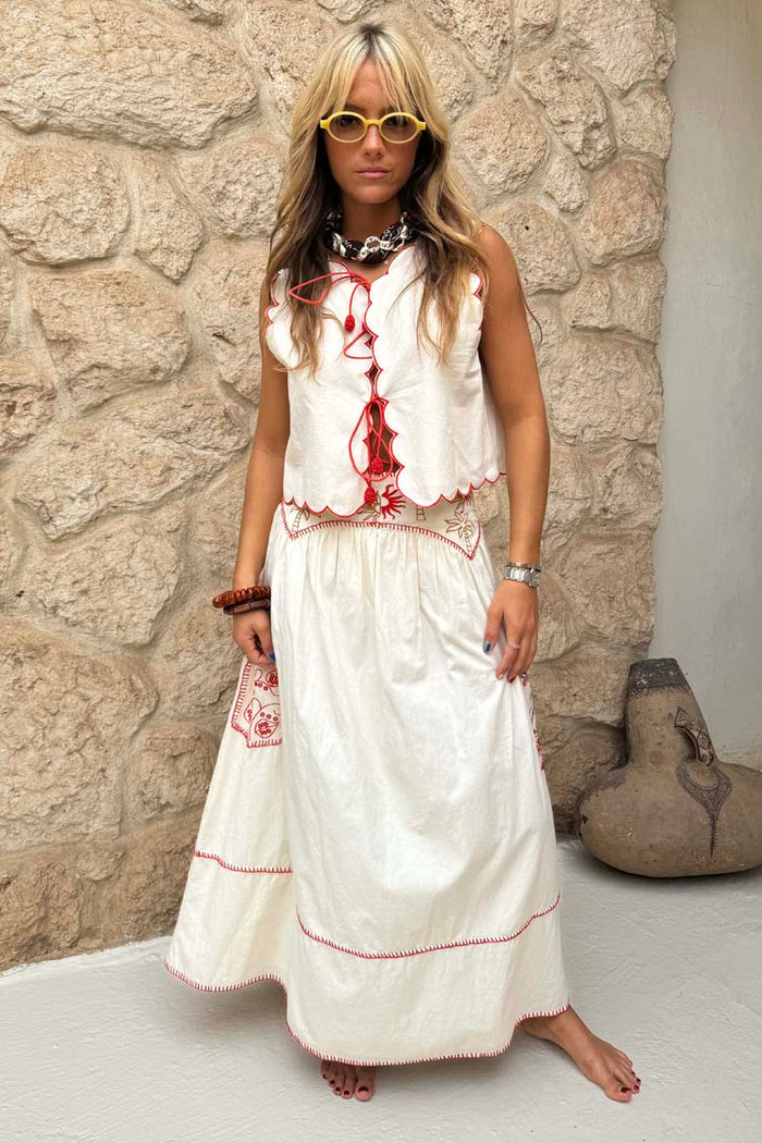 NFD X Caetana Cream and Red Pollenca cotton co-ord with scalloped edges and sun embroidery.