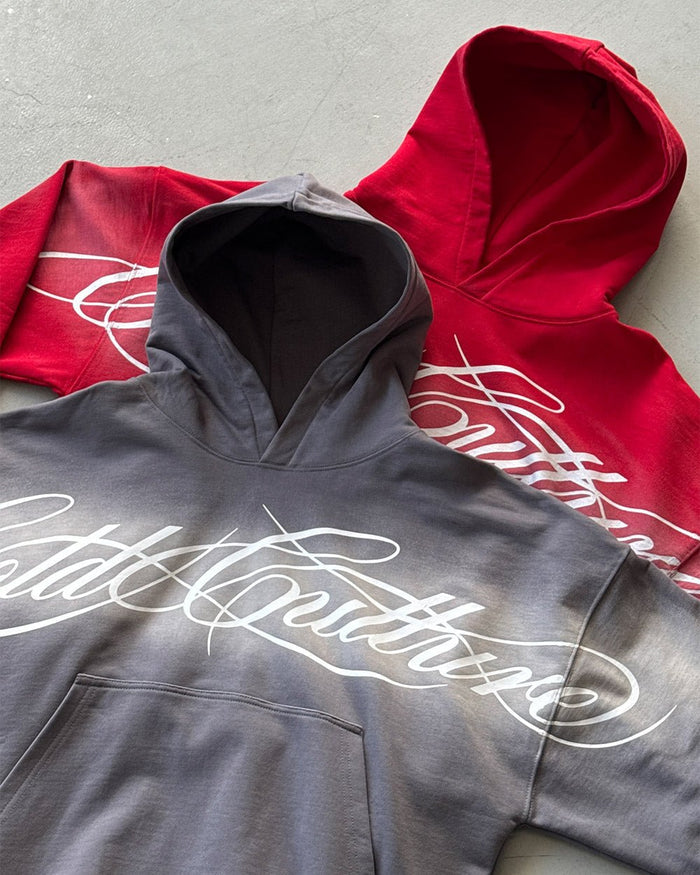 CROSSED SCRIPT HOODIE RED - red script print hoodie, flat lay with matching pieces - Cold Culture