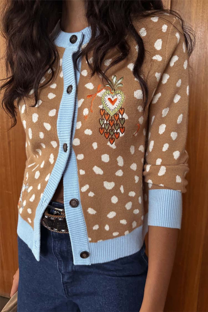 Tan deer print Hollie knit cardigan with light blue ribbed trim and a colourful heart embroidery.