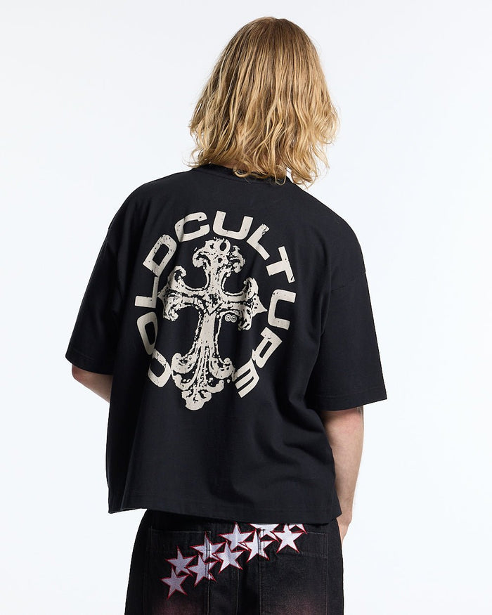 DISCHARGE TEE BLACK - black oversized graphic tee, back view on male model - Cold Culture