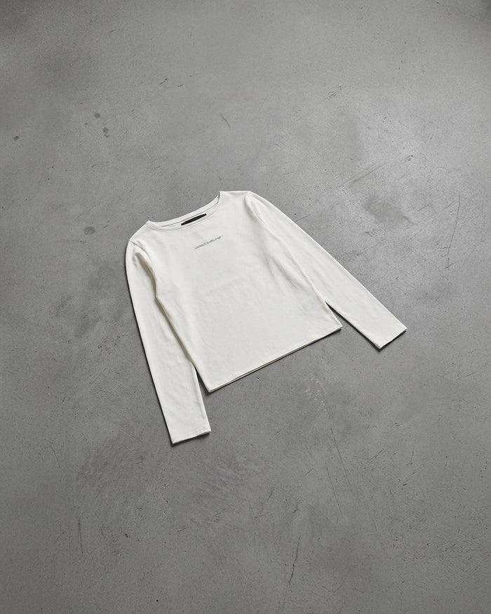 ESSENTIAL LONGSLEEVE TEE WHITE - white women's longsleeve tee, flat lay - Cold Culture