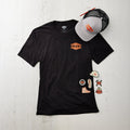 Black BRUNT t-shirt with black and grey BRUNT hat and BRUNT signature stickers
