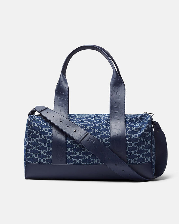 FEVER BAG BLUE - blue monogram duffle bag, side view - Cold Culture