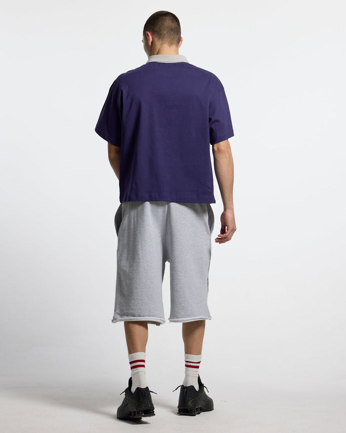 HEAT GYM POLO NAVY - navy zip polo shirt, back view on male model - Cold Culture