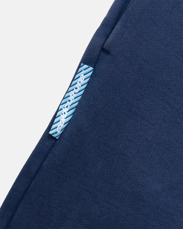 HIDE AND SEEK SWEATPANTS NAVY - navy double waistband sweatpants, detail close-up - Cold Culture