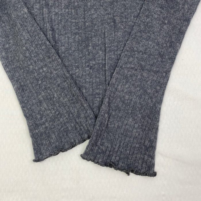 Irregularly cut, flared collar top