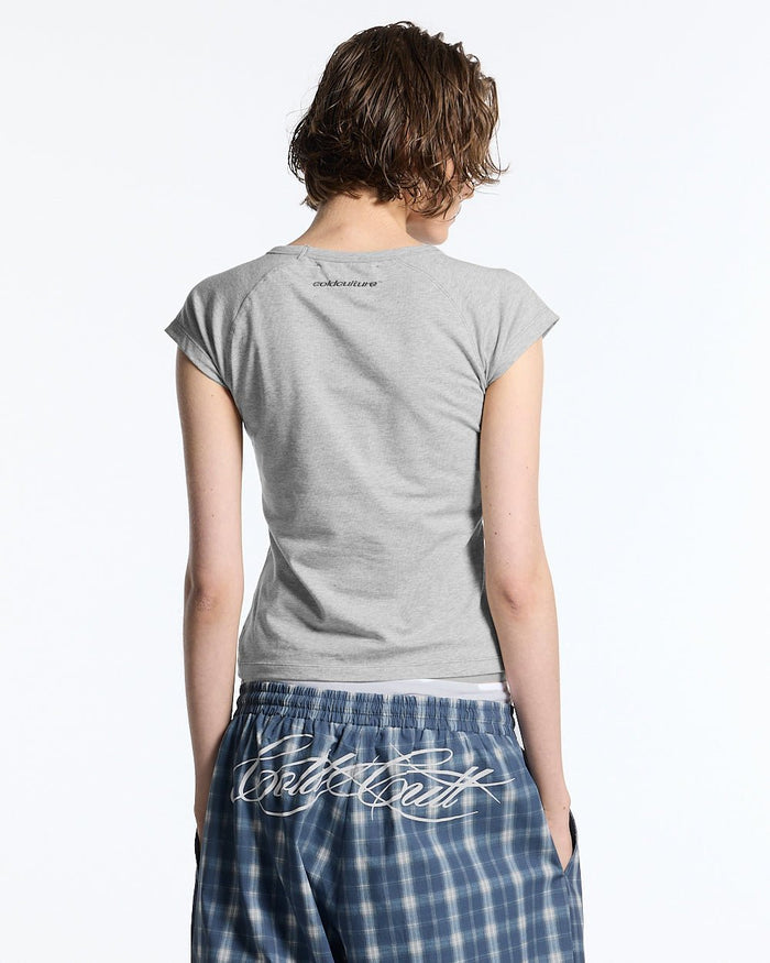 LITTLE BABY TEE HEATHER GREY - heather grey graphic baby tee, back view on female model - Cold Culture