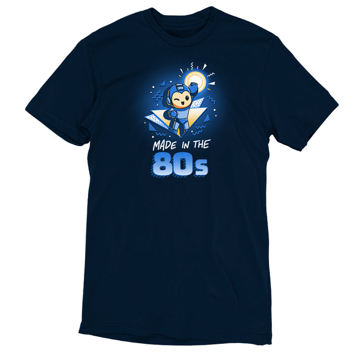 Premium Cotton T-shirt_TeeTurtle navy blue Made in the 80s featuring a winking Mega Man with his blaster arm in the air surrounded by 80s graphic elements, and the caption, "Made in the 80s".