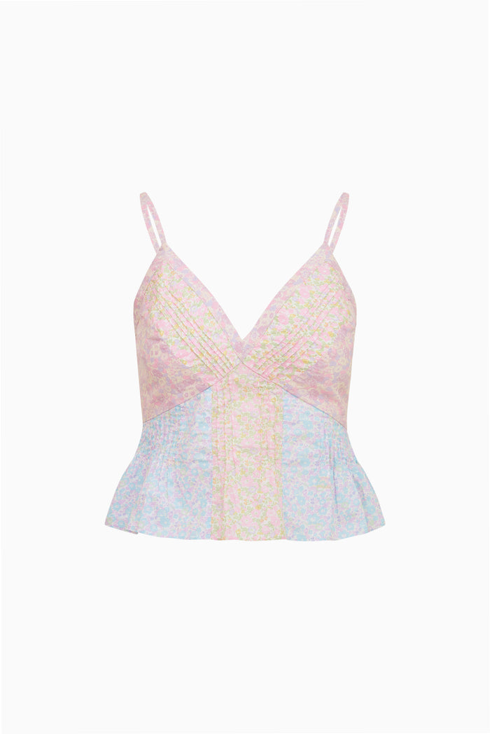 Pastel-colored lace sleeveles top on a white background