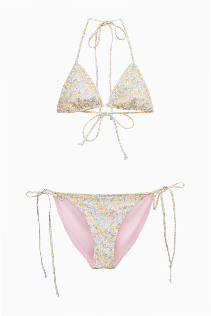 Floral bikini set with floral yellow and blue print on a white background