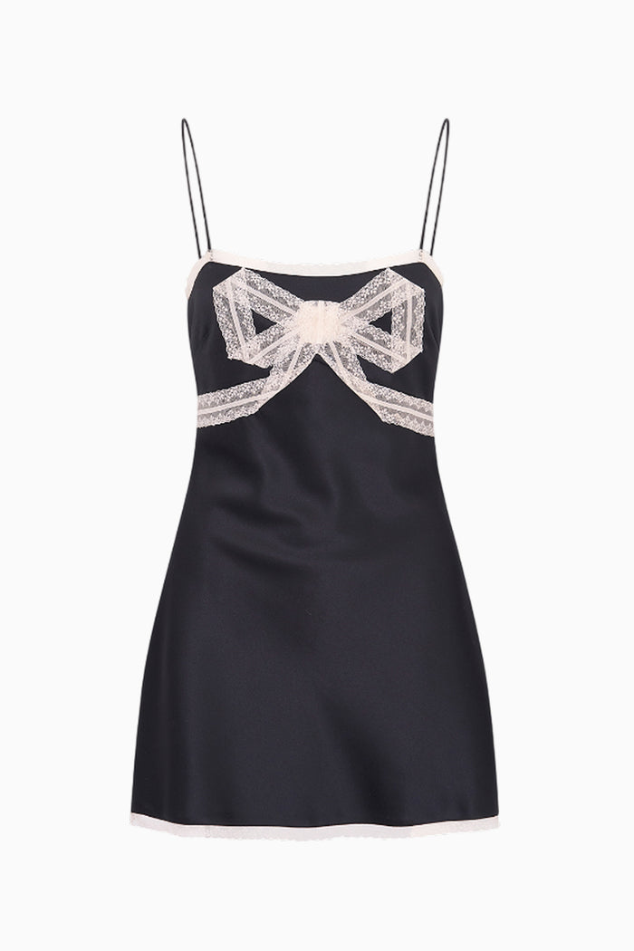 Black dress with lace bow on a white background