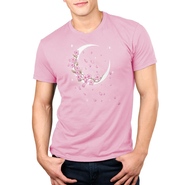 Premium Cotton T-shirt_TeeTurtle light pink Moon Blossoms apparel featuring an artistic crescent moon with cherry blossoms on it and petals all around.