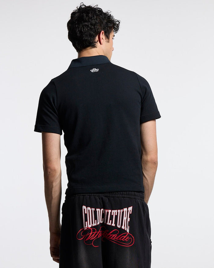 NIA SET POLO BLACK - black graphic print polo shirt, back view on male model - Cold Culture #man