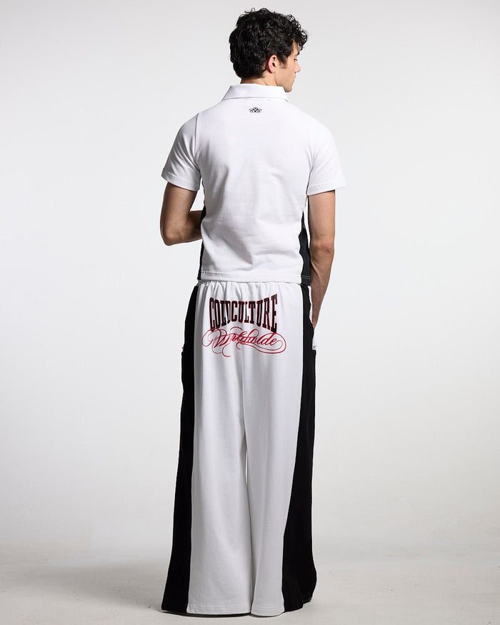 NIA SET POLO WHITE & BLACK - white and black polo shirt, back view on male model - Cold Culture #man