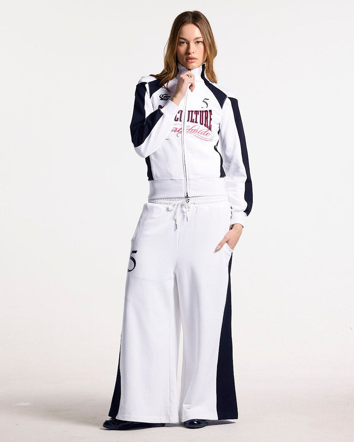 NIA SET ZIP UP WHITE & BLACK - white and black zip-up hoodie, front view on female model - Cold Culture #woman