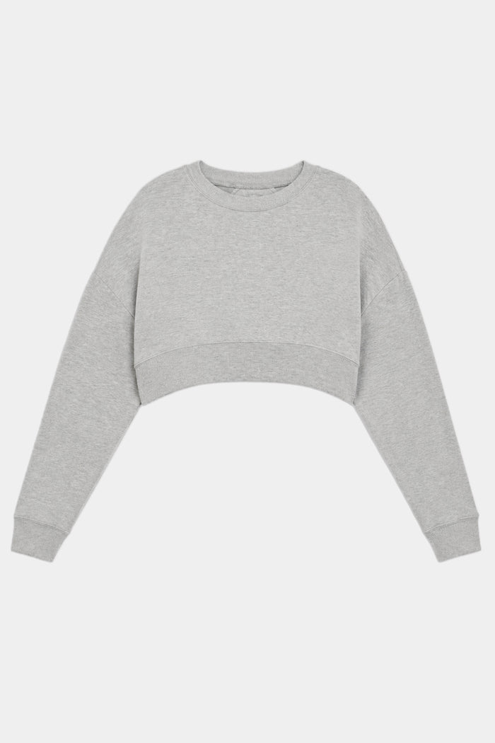 The SPLITS59 Noah Fleece Crop Sweatshirt in heather grey is a long-sleeve, soft modal-spandex blend top with a cropped fit, displayed against a plain white background.