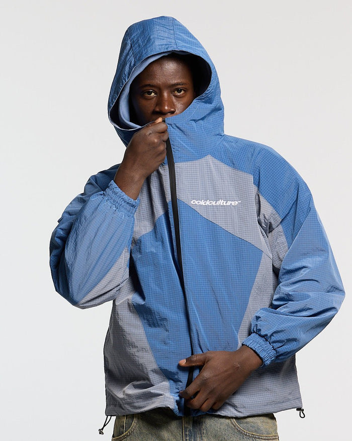 NOT FORMAL JACKET BLUE - blue colorblock hooded jacket, front view on male model - Cold Culture #man