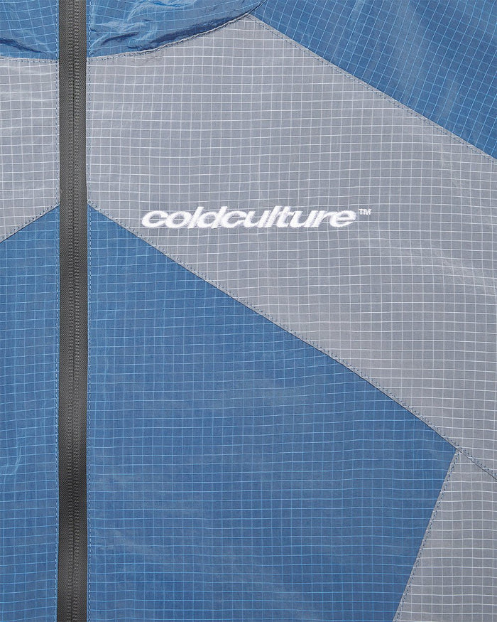 NOT FORMAL JACKET BLUE - blue colorblock hooded jacket, detail close-up - Cold Culture