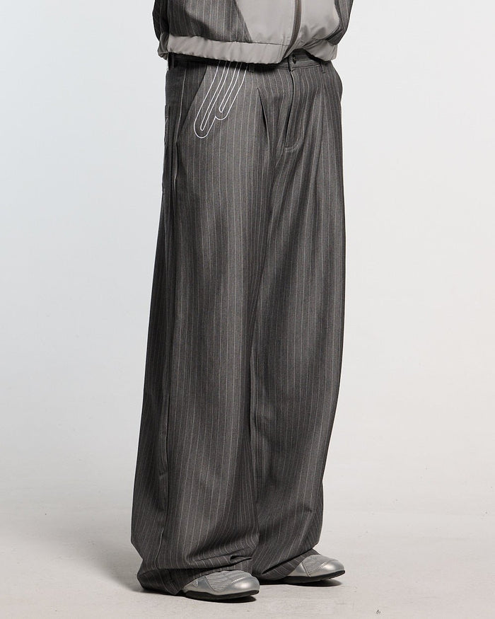 NOT FORMAL SET PANTS GREY - grey pinstripe pants, front view on male model - Cold Culture #man