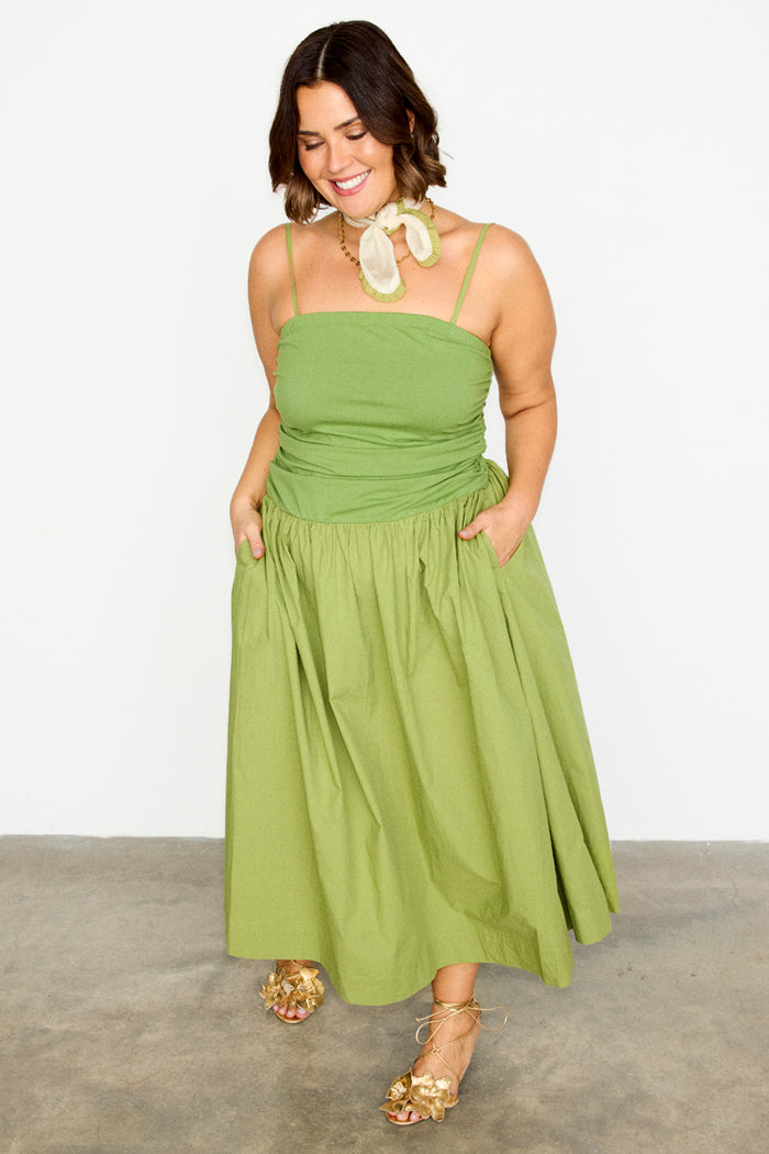 Olive green Lola Mid-axi Dress featuring a ruched bodice and full cotton skirt, designed for inclusive sizing.