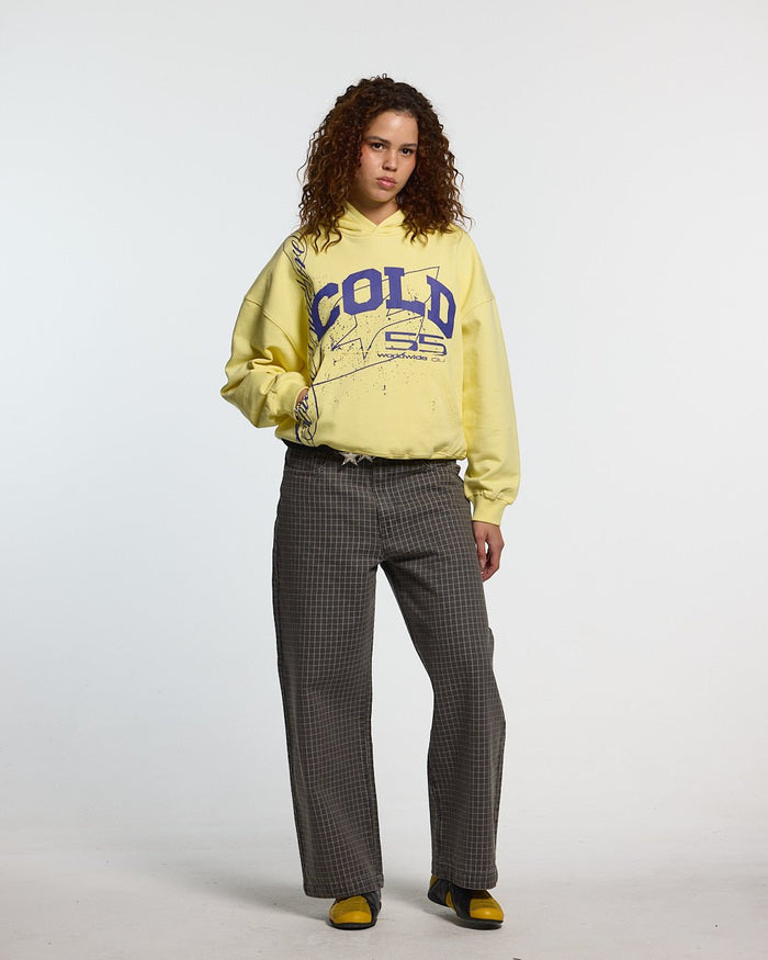 ON ROAD HOODIE YELLOW & BLUE - yellow graphic print hoodie, front view on female model - Cold Culture #woman