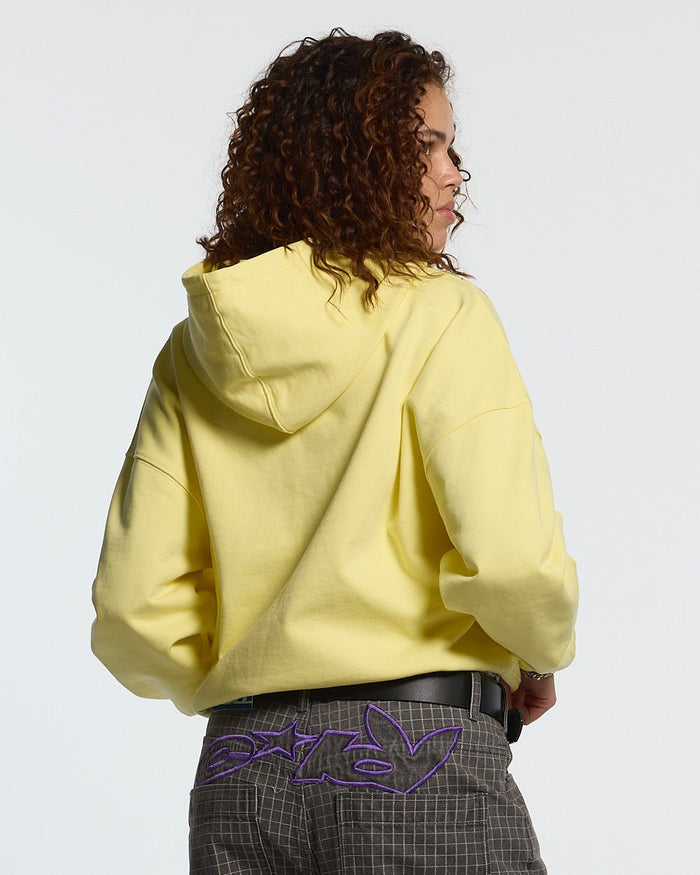 ON ROAD HOODIE YELLOW & BLUE - yellow graphic print hoodie, back view on female model - Cold Culture #woman
