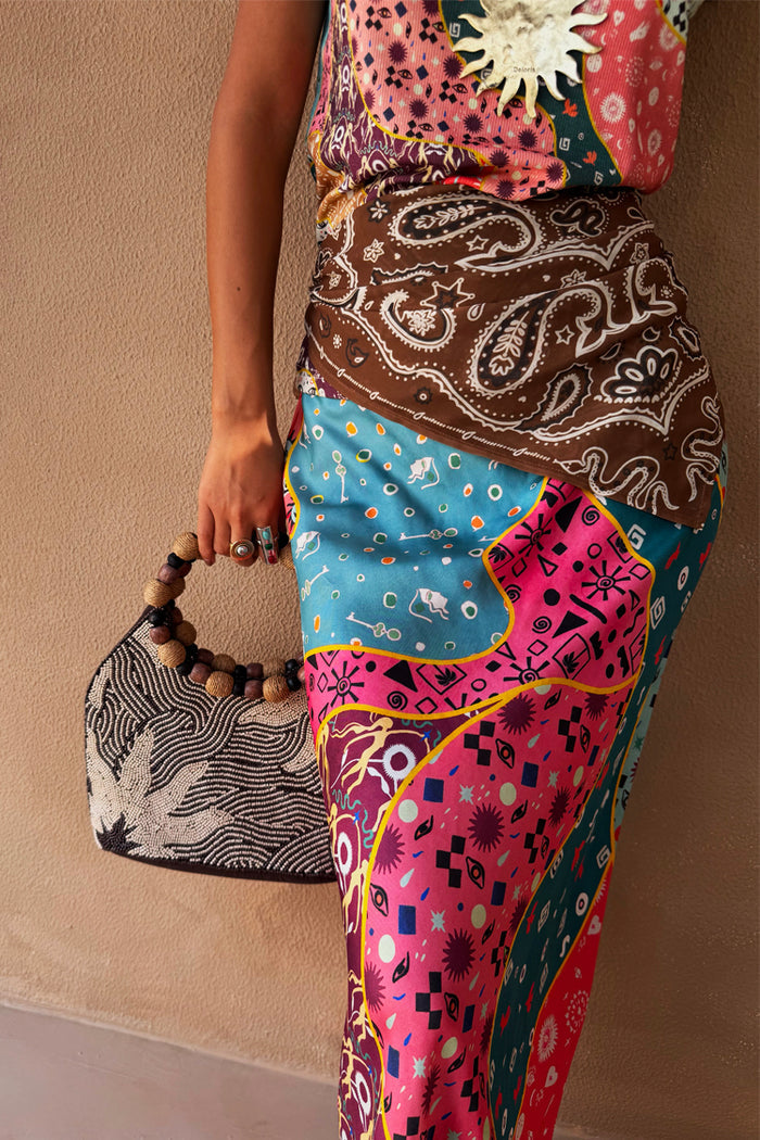 Pastel Morocco Dorris Skirt featuring sun and eye motifs in a multi-colour print with a brown paisley panel.