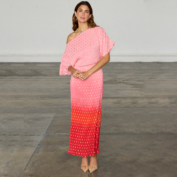 Pink and red ombre Tilly Dress in gold-shimmer plisse with an off-the-shoulder neckline on a model.