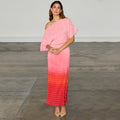 Pink and red ombre Tilly Dress in gold-shimmer plisse with an off-the-shoulder neckline on a model.