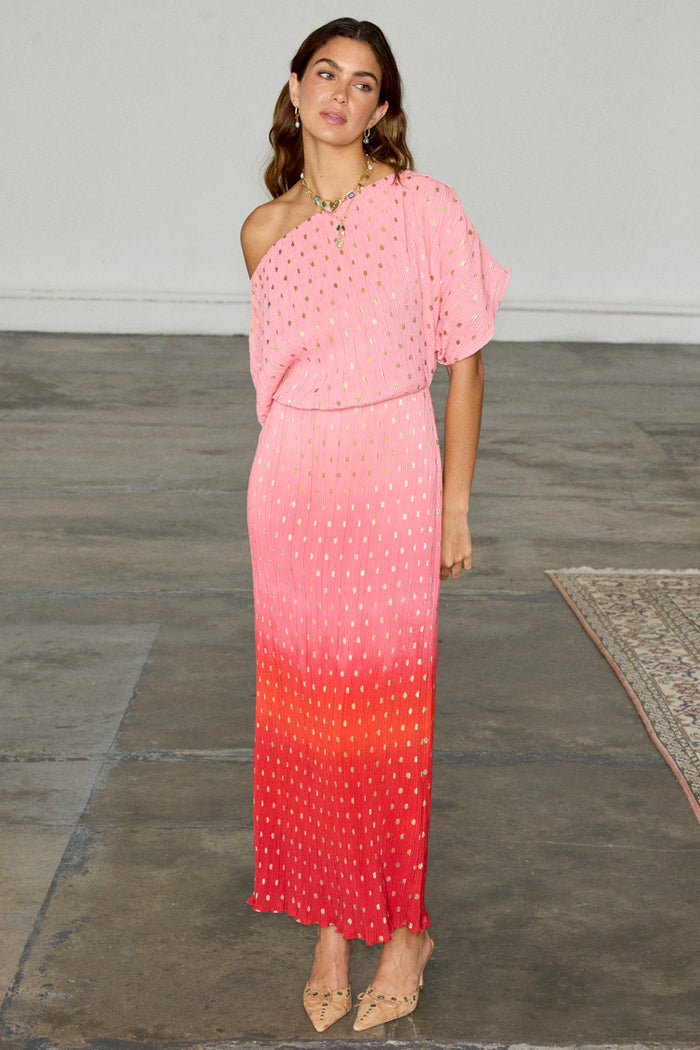 Pink Ombre Tilly Dress in plisse with gold shimmer flecks and a one-shoulder neckline, shown on a model.