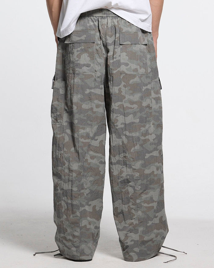 RESERVED CARGO PANTS CAMO - grey camo cargo pants, back view on male model - Cold Culture #man