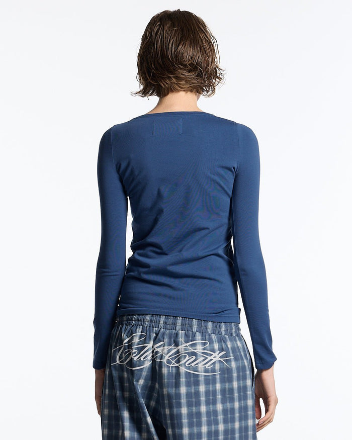 ROUGH LONGSLEEVE TEE BLUE - blue script print longsleeve tee, back view on female model - Cold Culture