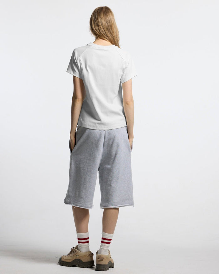 RUN CLUB TEE WHITE - white fitted sport tee, back view on female model - Cold Culture #woman