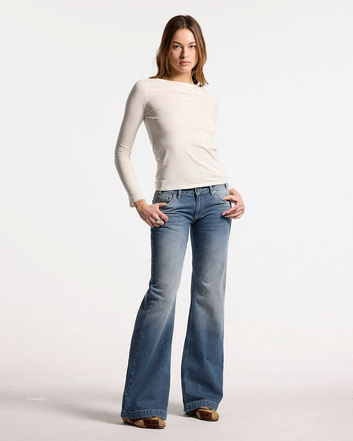 SCRIPT BOOTCUT JEANS BLUE - blue washed bootcut jeans, front view on female model - Cold Culture #woman