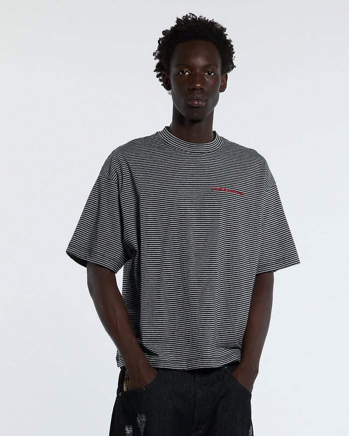 SCRIPTED STRIPES TEE BLACK - black striped tee, front view on male model - Cold Culture