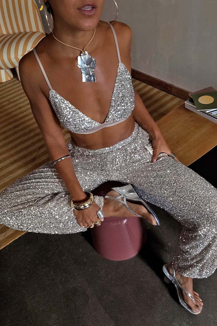 Silver Sequin Bra with adjustable straps, styled with matching trousers for a coordinated party look.