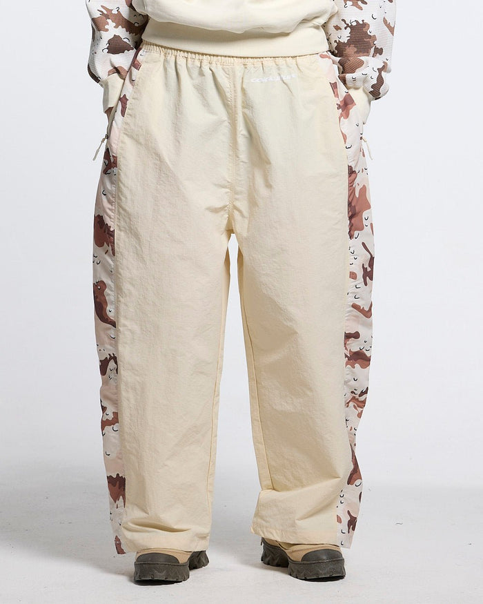 SPIDER PANTS BEIGE & CAMO - beige camo panel sweatpants, front view on male model - Cold Culture #man