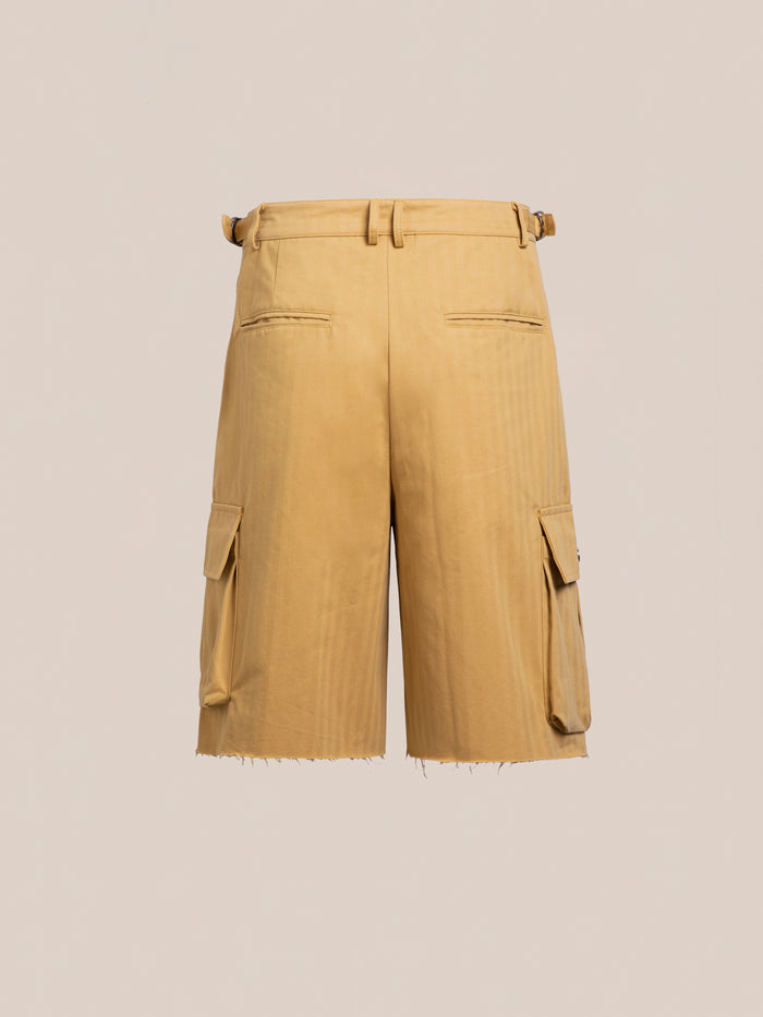 FOUND Sunlight Twill Cargo Shorts: unisex tan cargo shorts in herringbone twill with belt loops, side cargo pockets, back welt pockets, and raw-cut hems—shown on a plain light background.