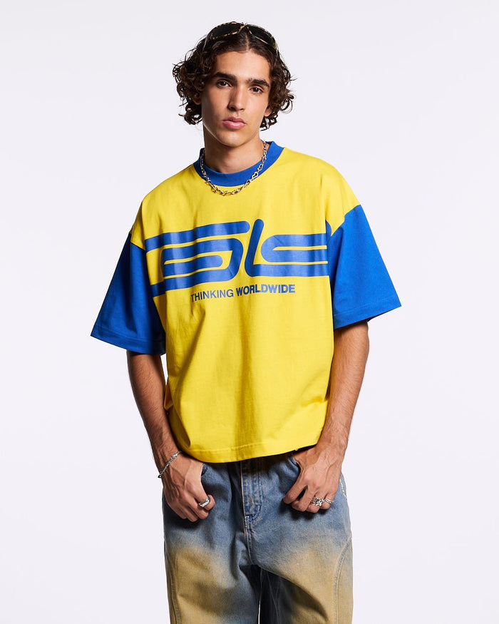 TEEN SPIRIT ERA TEE YELLOW AND BLUE - yellow and blue graphic print tee, front view on male model - Cold Culture #man