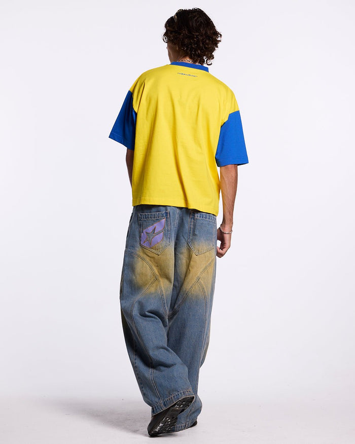 TEEN SPIRIT ERA TEE YELLOW AND BLUE - yellow and blue graphic print tee, back view on male model - Cold Culture #man