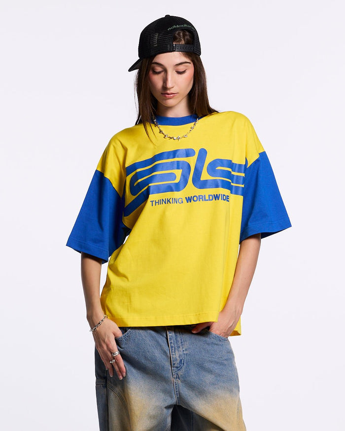 TEEN SPIRIT ERA TEE YELLOW AND BLUE - yellow and blue graphic print tee, front view on female model - Cold Culture #woman