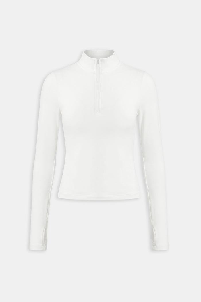 The SPLITS59 Tess Rigor Half Zip Waist Length in white is a soft nylon spandex, long-sleeve mock-neck top with a front half-zip closure, shown on a plain white background.